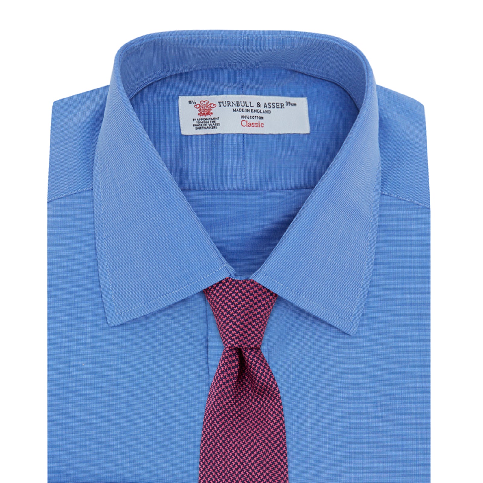 View 4 of product The Turnbull & Asser Dark Blue End-On-End Shirt features a T&A collar and 3-button cuffs, displayed neatly folded on a white background. Ideal for pairing with a navy suit, the label inside the collar is visible.