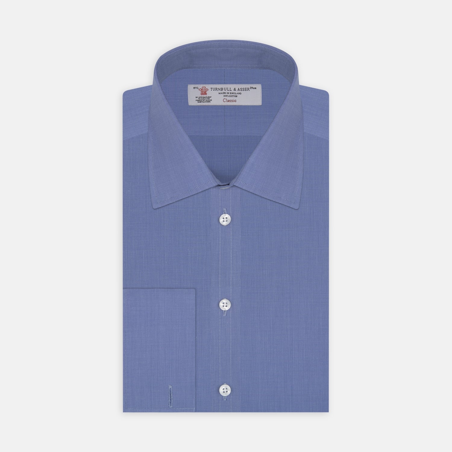 View 1 of product A neatly folded, dark blue end-on-end men's dress shirt by Turnbull & Asser, featuring a T&A collar and double cuffs, is displayed against a plain white background.