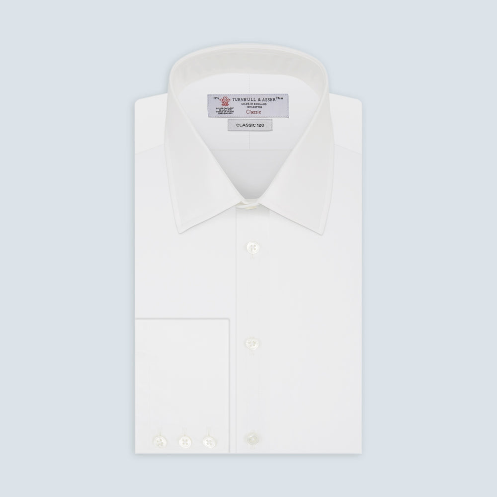 The Turnbull & Asser Two-Fold 120 White Shirt features a T&A collar and 3-button cuffs—an everyday essential, displayed against a light blue background.