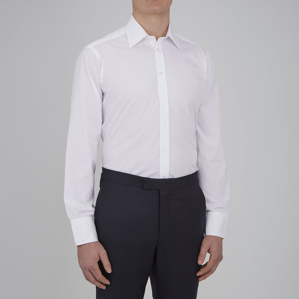 The Turnbull & Asser Two-Fold 120 White Shirt features a T&A collar and 3-button cuffs—an everyday essential, displayed against a light blue background.