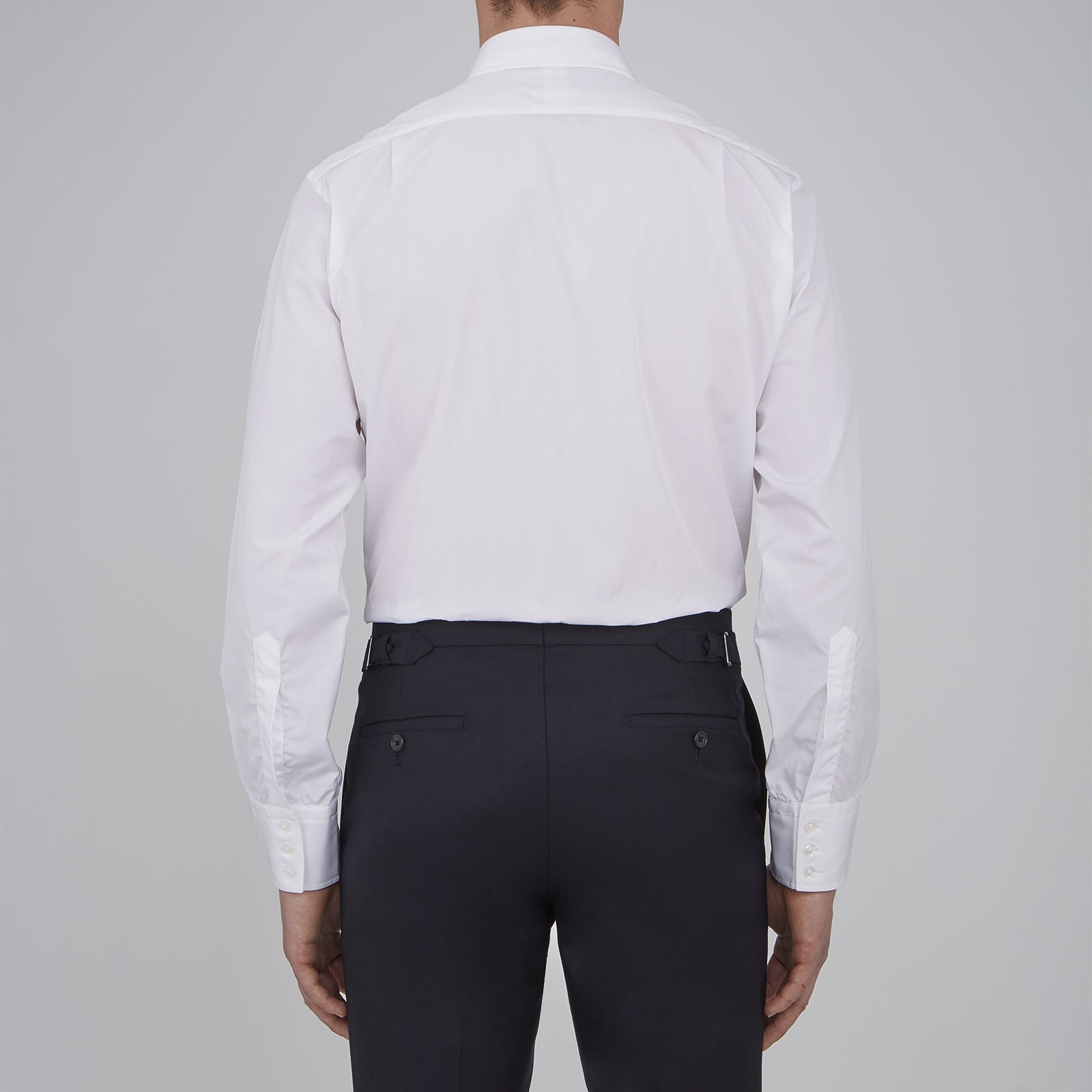 View 3 of product The Turnbull & Asser Two-Fold 120 White Shirt features a T&A collar and 3-button cuffs—an everyday essential, displayed against a light blue background.