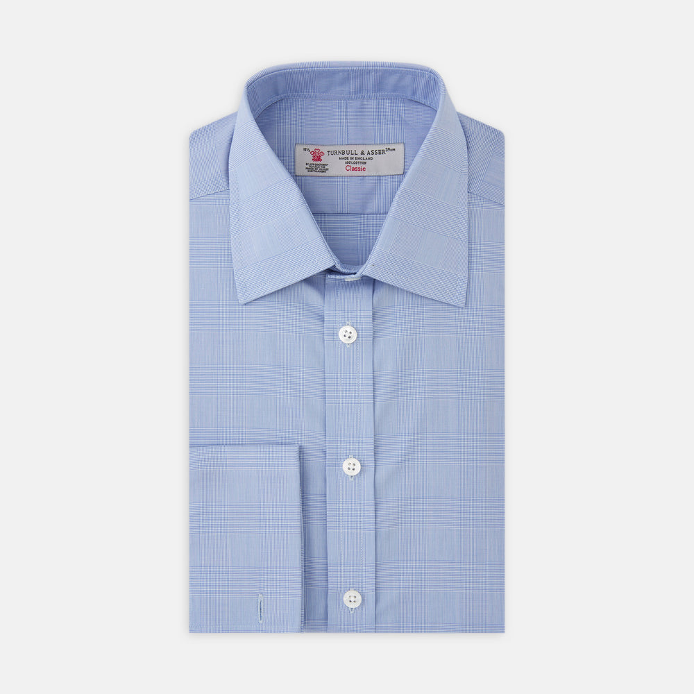 The Turnbull & Asser Blue Prince of Wales Check Shirt features a T&A collar and double cuffs, shown against a white background—ideal for timeless, minimalist style.