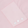 View 6 of product The Turnbull & Asser Pink Micro-Check Cotton Shirt features a T&A collar, 3-button cuffs, and a refined micro-check pattern, shown neatly folded against a white background.