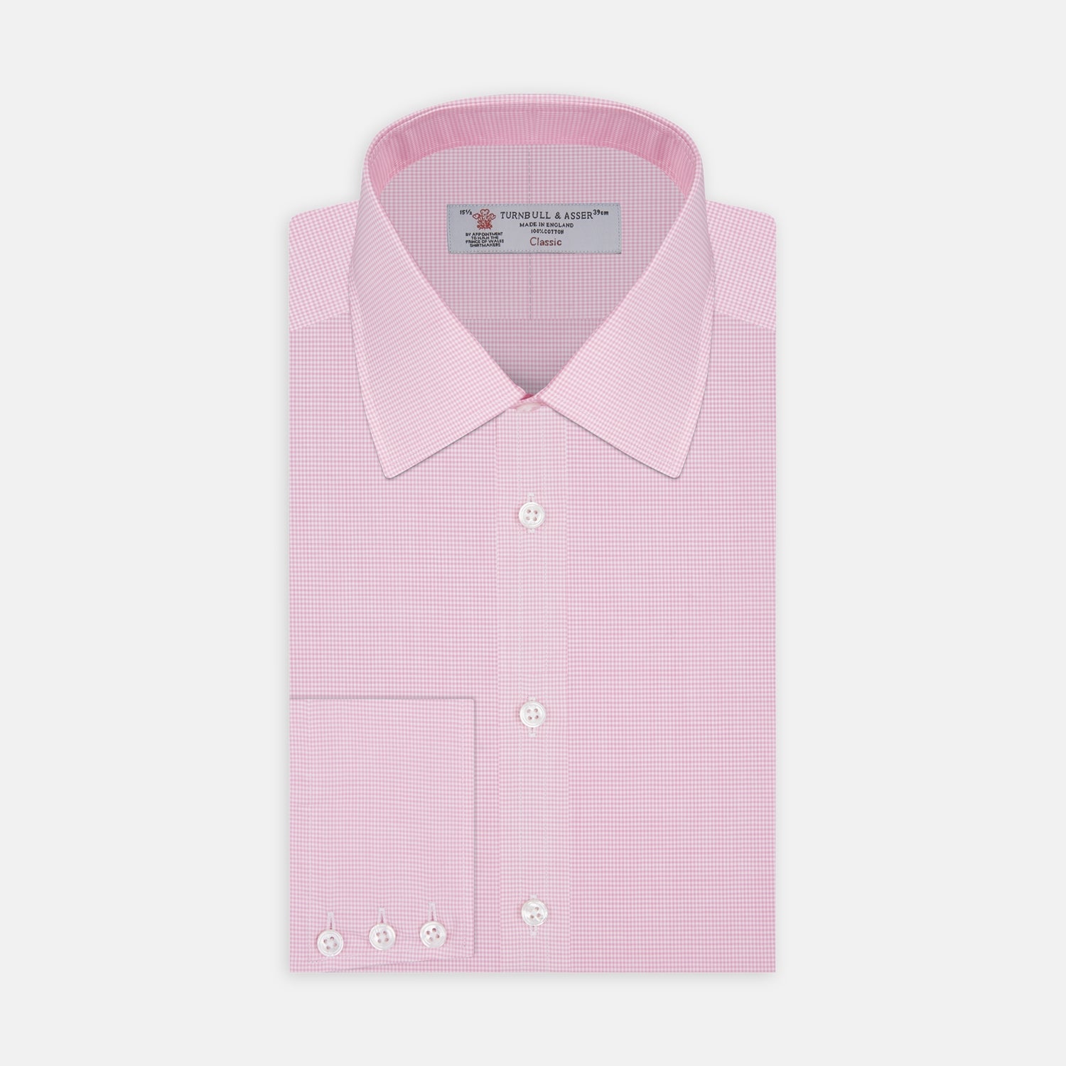 View 1 of product The Turnbull & Asser Pink Micro-Check Cotton Shirt features a T&A collar, 3-button cuffs, and a refined micro-check pattern, shown neatly folded against a white background.