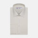The Turnbull & Asser Cream Herringbone Superfine Cotton Shirt features a T&A collar and 3-button cuffs, ideal for minimalist style or bold ties, shown neatly folded against a plain white background.