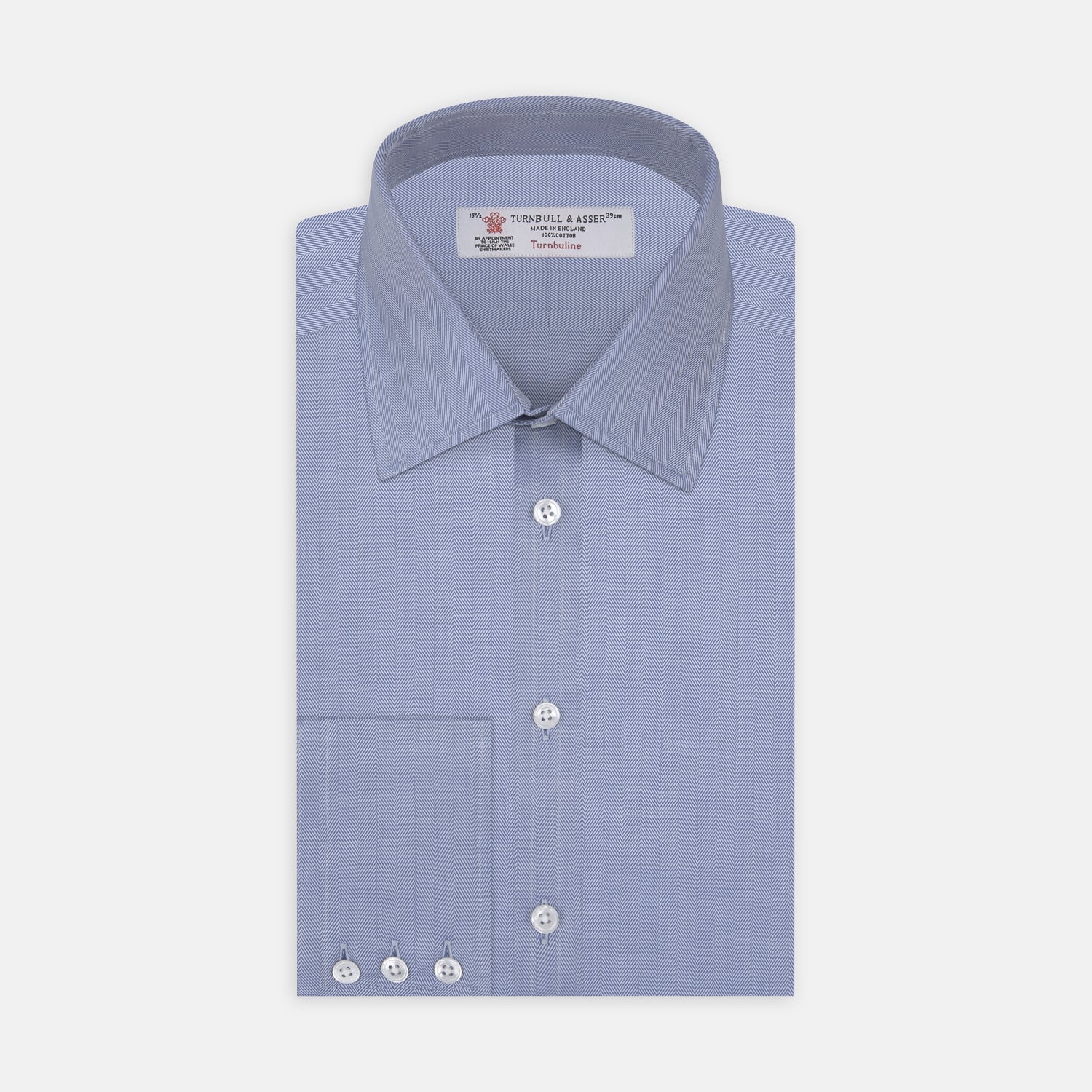 View 1 of product The Blue Herringbone Superfine Cotton Shirt by Turnbull & Asser features a T&A collar and 3-button cuffs, offering a refined minimalist look. Displayed against a plain white background.