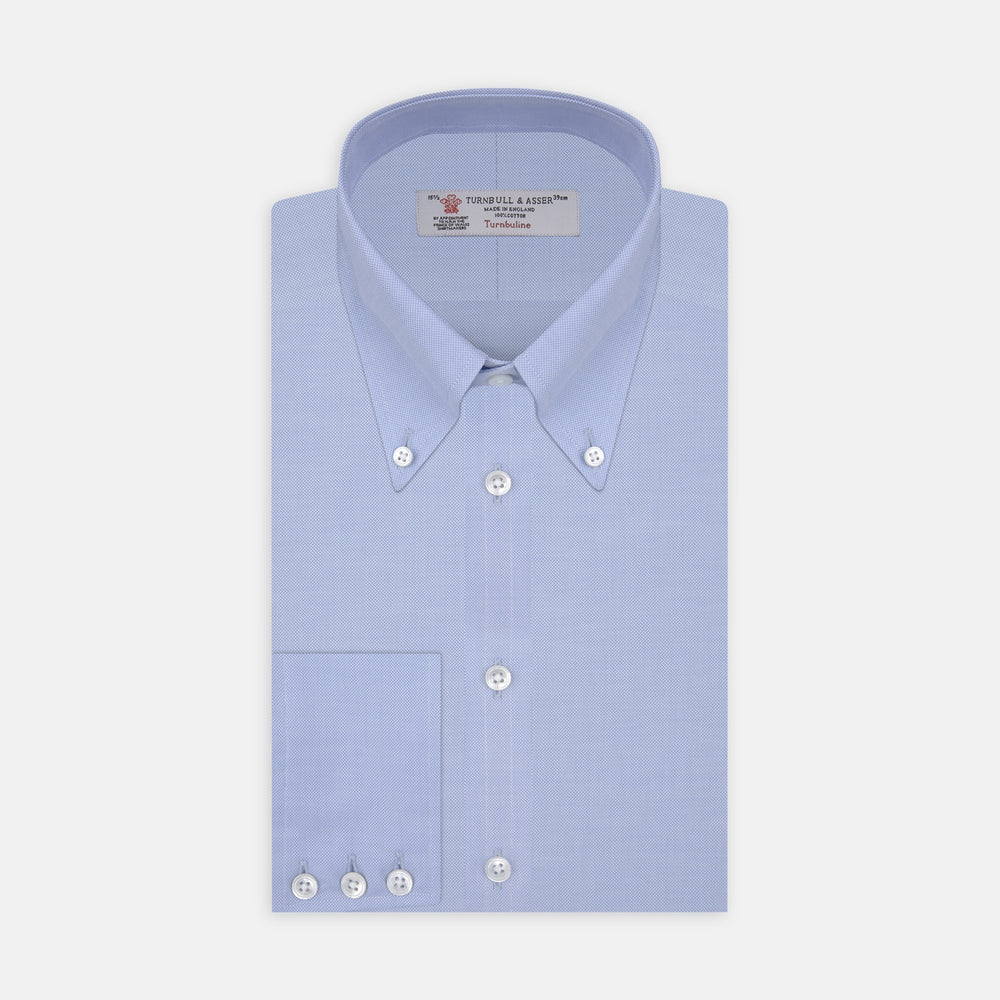 Turnbull & Asser's Light Blue Royal Oxford Cotton Shirt features a button-down collar, 3-button cuffs, and white buttons. Men's shirt comes neatly folded, with a branded neck label displaying garment details—ideal under a navy suit.