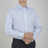 View 2 of product A neatly folded light blue long-sleeve dress shirt with a pointed collar and white buttons, styled with the Turnbull & Asser Monochrome Paisley Mill Silk Pocket Square (limited edition), displayed against a plain white background.
