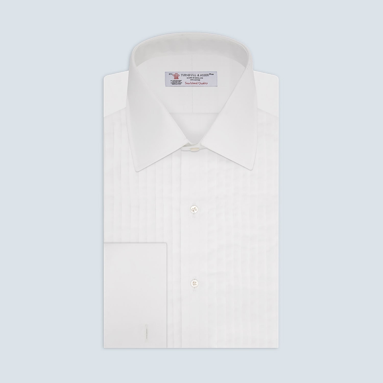 View 1 of product The Turnbull & Asser White Sea Island Quality Cotton Dress Shirt features a T&A collar and double cuffs, elegantly displayed on a light gray background.