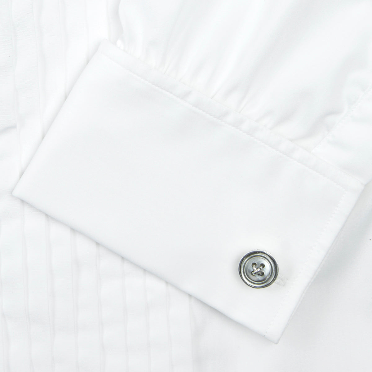 View 6 of product The Turnbull & Asser White Sea Island Quality Cotton Dress Shirt features a T&A collar and double cuffs, elegantly displayed on a light gray background.