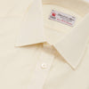 View 5 of product The Cream Sea Island Quality Cotton Shirt by Turnbull & Asser features a T&A collar and 3-button cuffs, crafted from premium cotton and displayed neatly folded against a plain white background.
