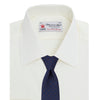 View 4 of product The Turnbull & Asser Cream Sea Island Quality Cotton Shirt features a T&A collar, double cuffs, and a button-down front, elegantly displayed against a white background.