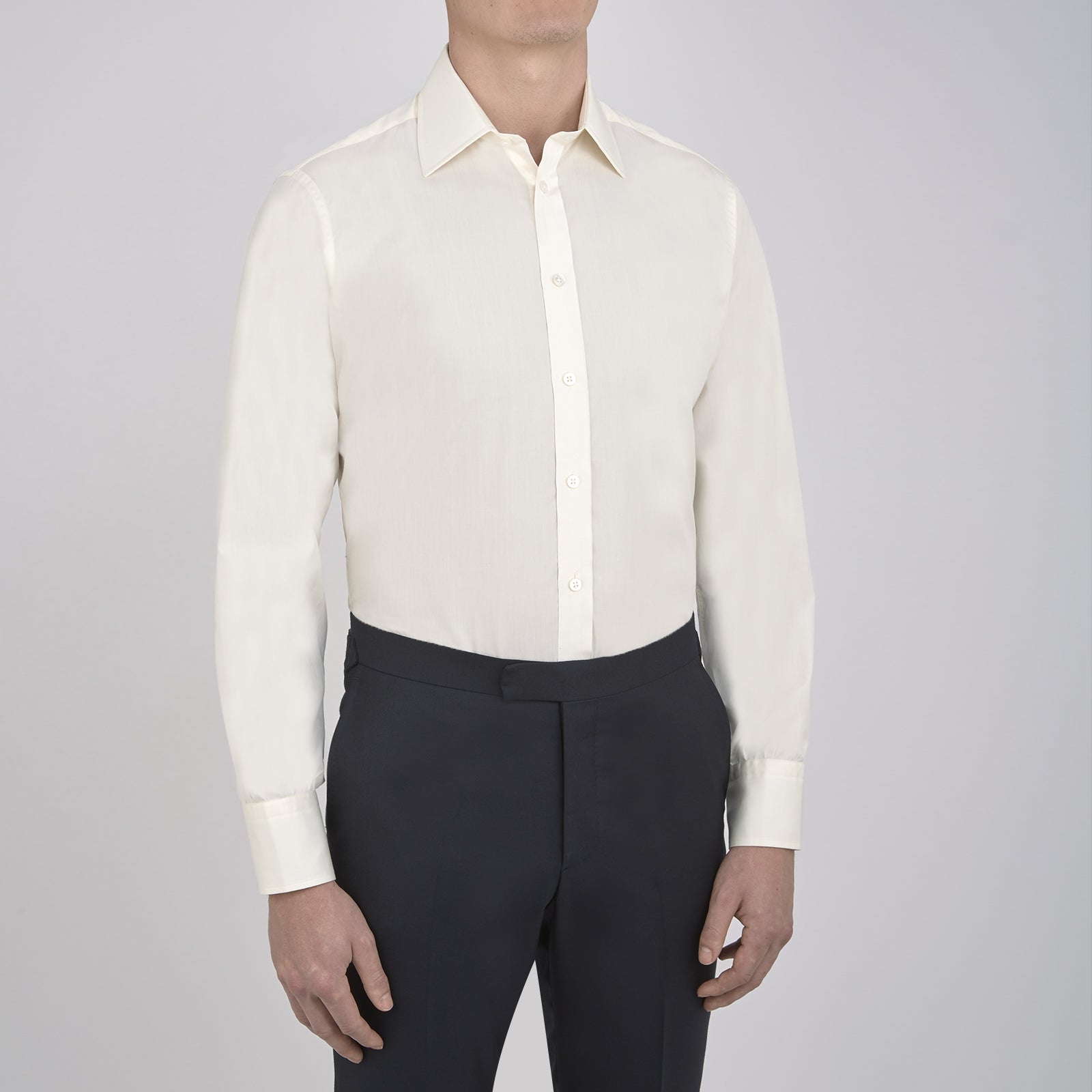View 2 of product The Cream Sea Island Quality Cotton Shirt by Turnbull & Asser features a T&A collar and 3-button cuffs, crafted from premium cotton and displayed neatly folded against a plain white background.