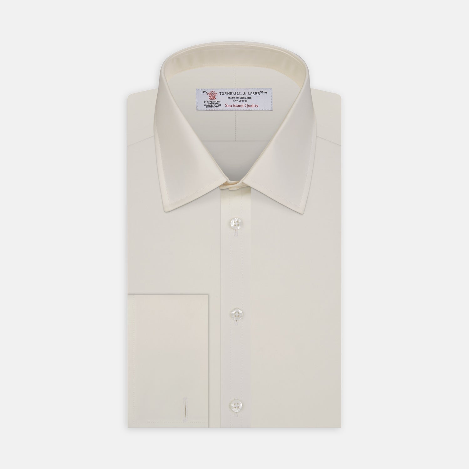 View 1 of product The Turnbull & Asser Cream Sea Island Quality Cotton Shirt features a T&A collar, double cuffs, and a button-down front, elegantly displayed against a white background.
