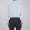 View 3 of product A neatly folded Light Blue Sea Island Quality Cotton Shirt by Turnbull & Asser, featuring a T&A collar and double cuffs, is displayed against a plain white background with the brand label visible inside the collar.