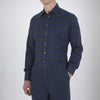 View 2 of product The Turnbull & Asser Blackwatch Brushed Cotton Shirt features a T&A collar, button cuffs, and a stylish dark blue and green plaid—perfect for any seasonal collection. Displayed here neatly folded on a plain white background.
