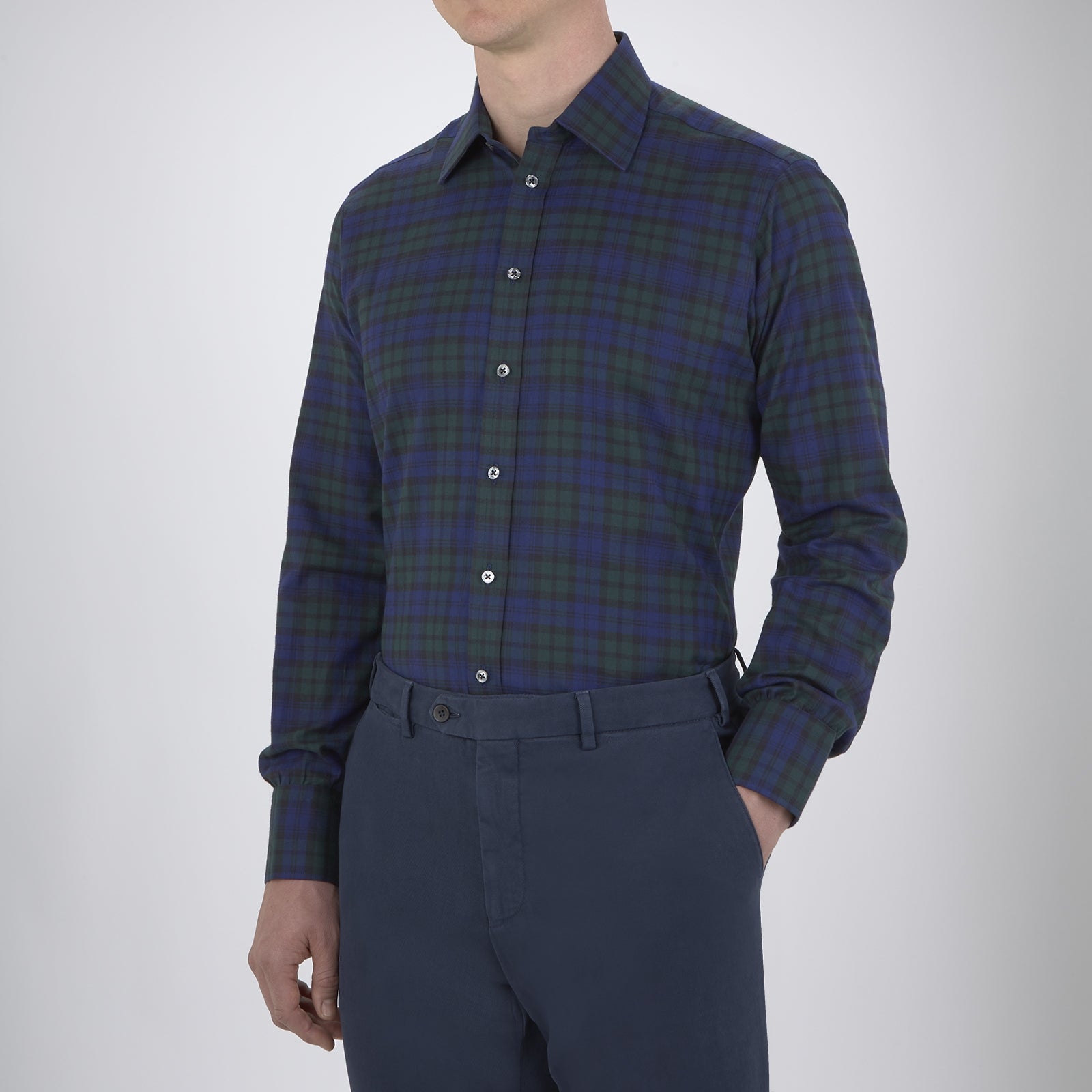 View 2 of product The Turnbull & Asser Blackwatch Brushed Cotton Shirt features a T&A collar, button cuffs, and a stylish dark blue and green plaid—perfect for any seasonal collection. Displayed here neatly folded on a plain white background.
