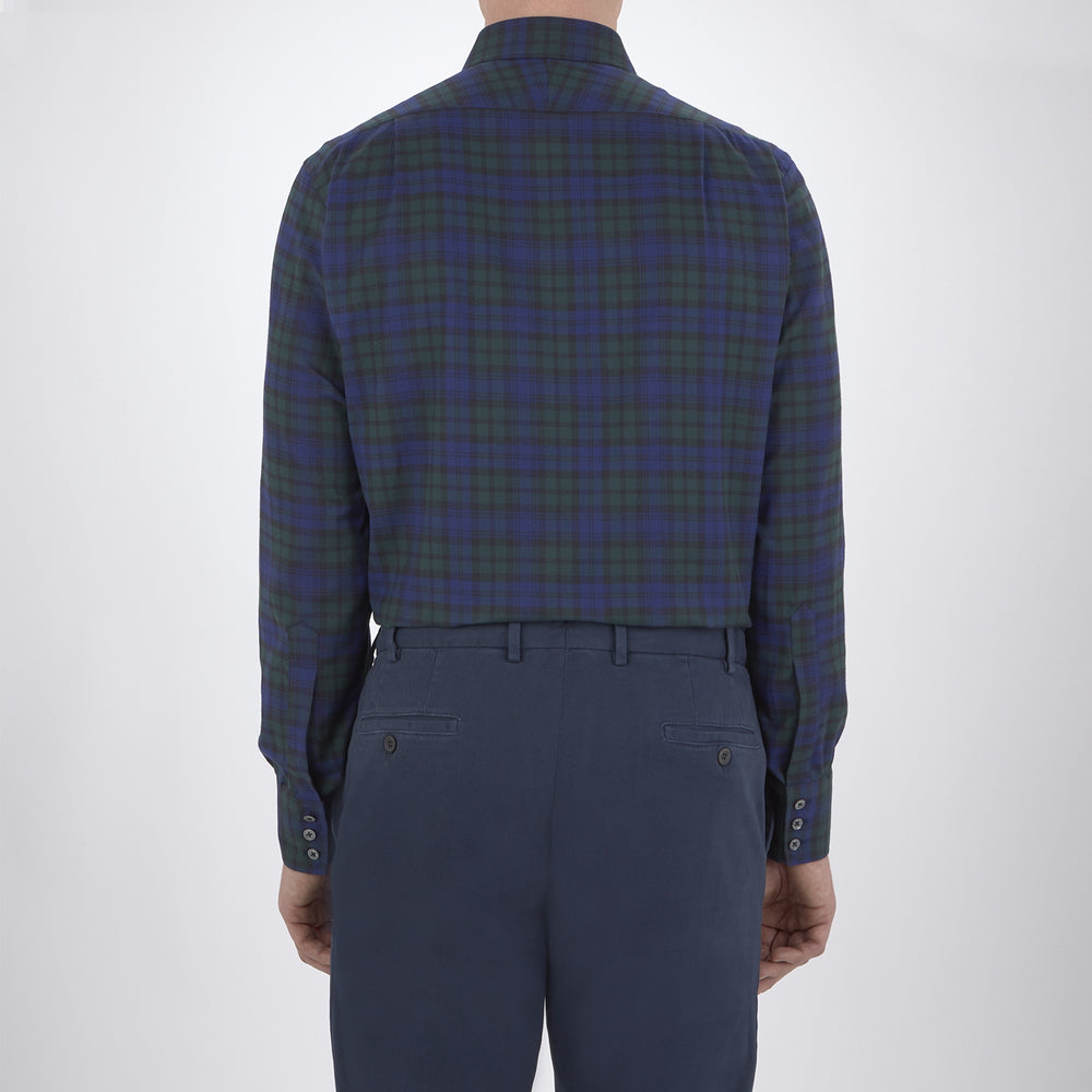 The Turnbull & Asser Blackwatch Brushed Cotton Shirt features a T&A collar, button cuffs, and a stylish dark blue and green plaid—perfect for any seasonal collection. Displayed here neatly folded on a plain white background.