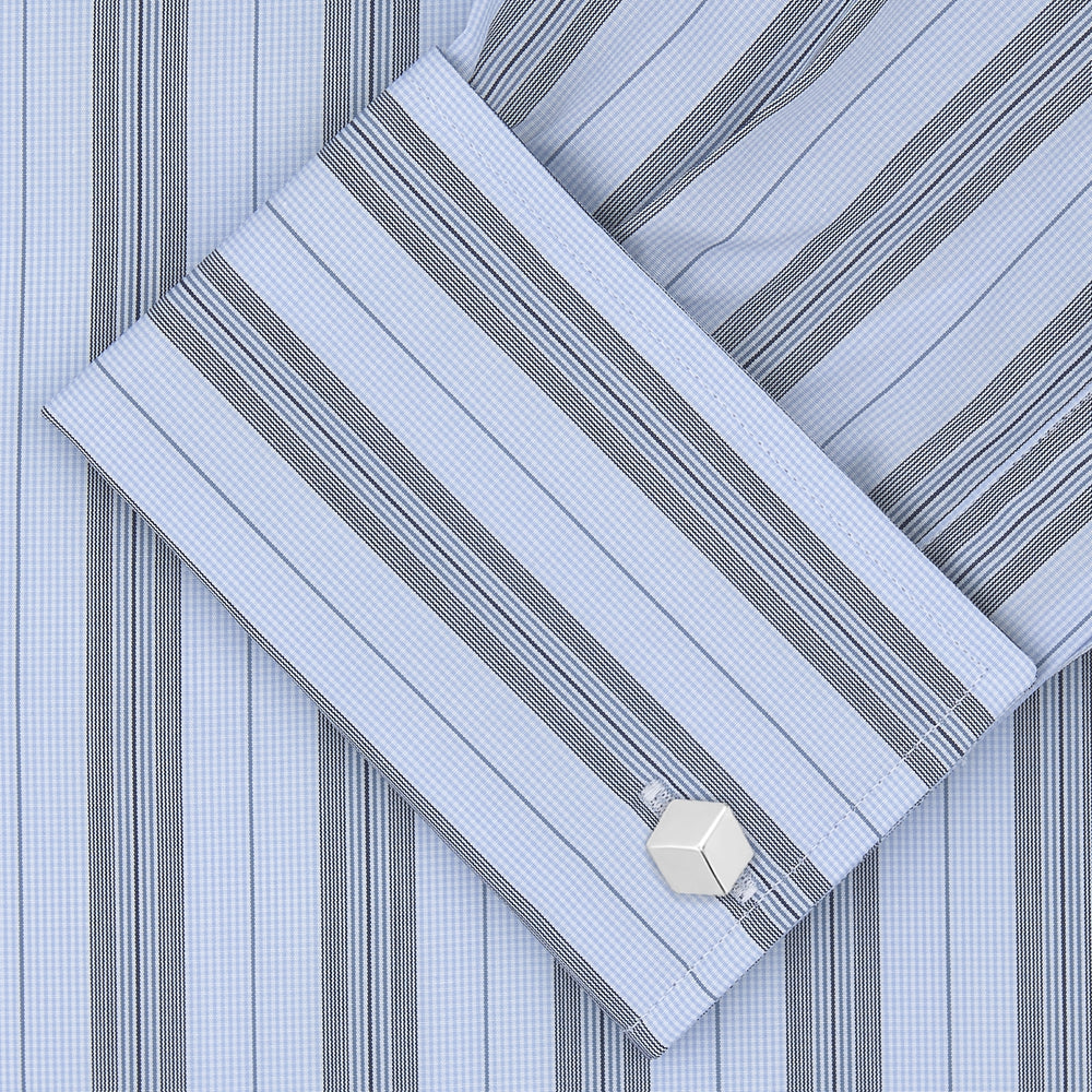 The Turnbull & Asser Grey, Turquoise and Sky Blue Mixed Stripe Shirt features a T&A collar, double cuffs, and elegant vertical stripes, neatly displayed on a plain light background.