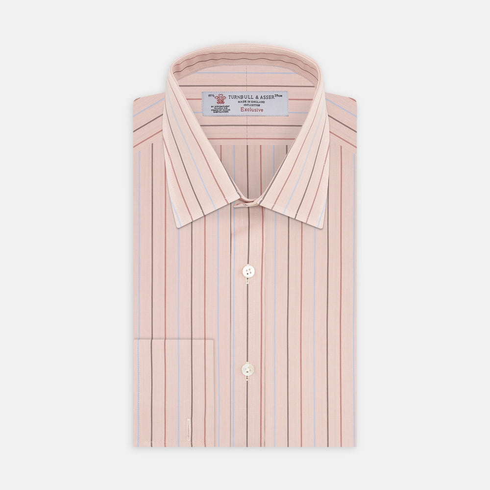Turnbull & Asser’s Pink, Red and Blue Pencil Stripe Shirt features a T&A collar, double cuffs, and multicolored vertical stripes on a light pink base—perfect for adding spring style to your wardrobe.