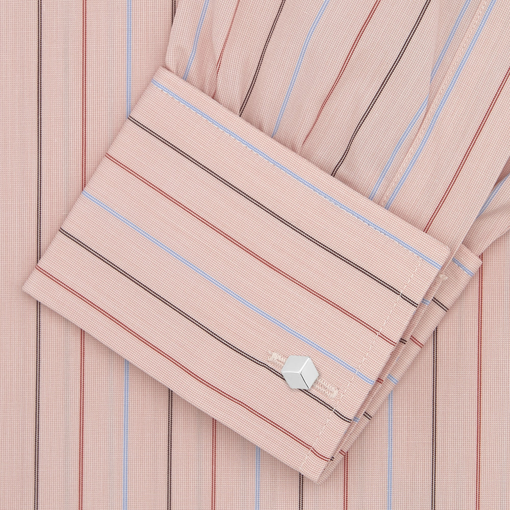 Turnbull & Asser’s Pink, Red and Blue Pencil Stripe Shirt features a T&A collar, double cuffs, and multicolored vertical stripes on a light pink base—perfect for adding spring style to your wardrobe.