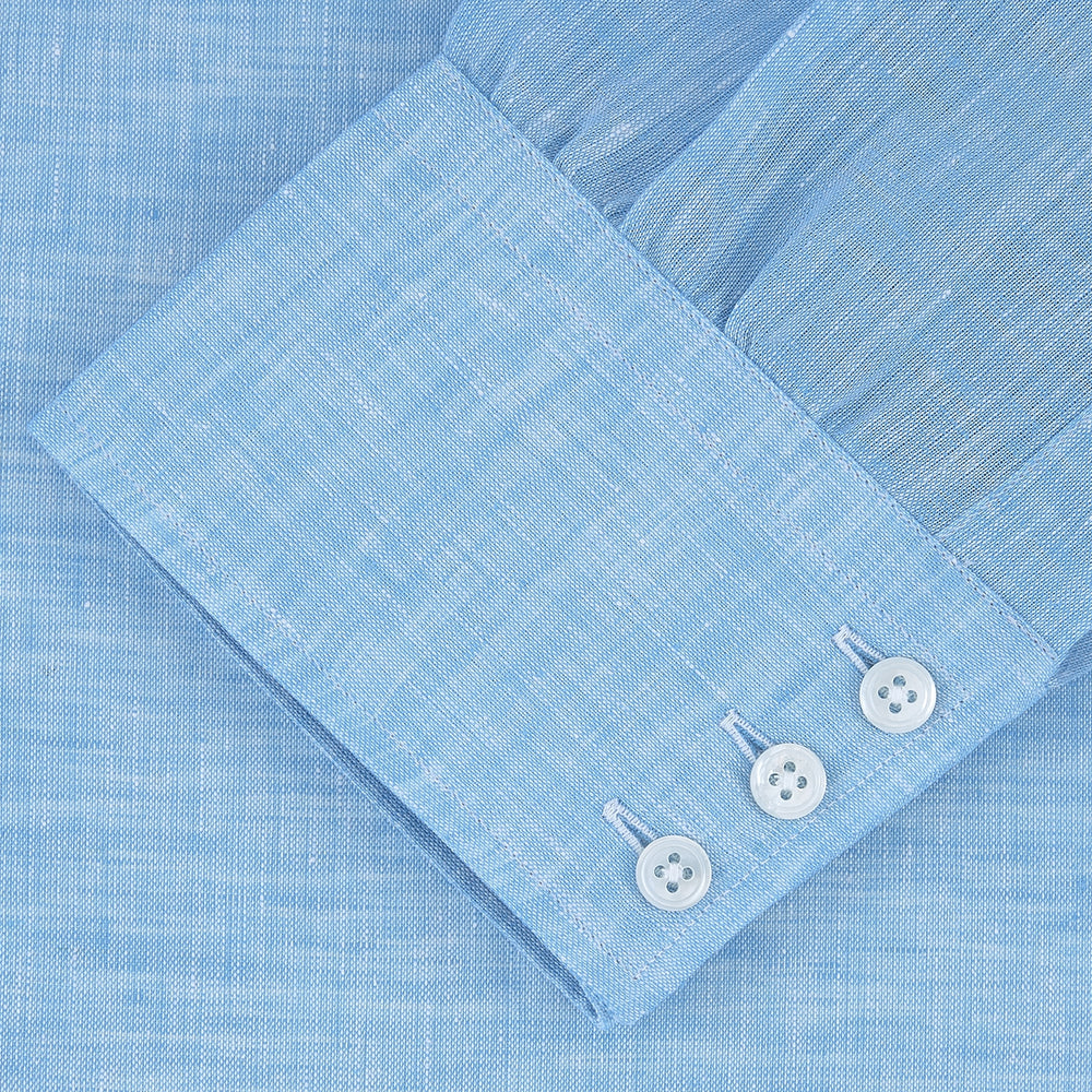 The Turquoise Linen Shirt by Turnbull & Asser features a T&A collar and 3-button cuffs, neatly displayed on a white background—an elegant summer essential for effortless style.