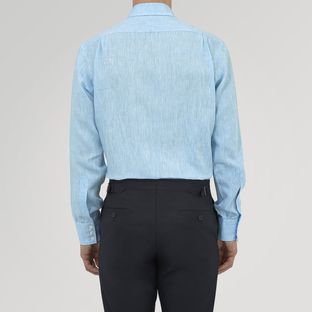 The Turquoise Linen Shirt by Turnbull & Asser features a T&A collar and 3-button cuffs, neatly displayed on a white background—an elegant summer essential for effortless style.