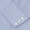 View 2 of product The Turnbull & Asser Blue and White Bold Check Shirt features a T&A collar, 3-button cuffs, and a classic plaid in blue and white, neatly folded with white buttons, displayed on a plain white background.