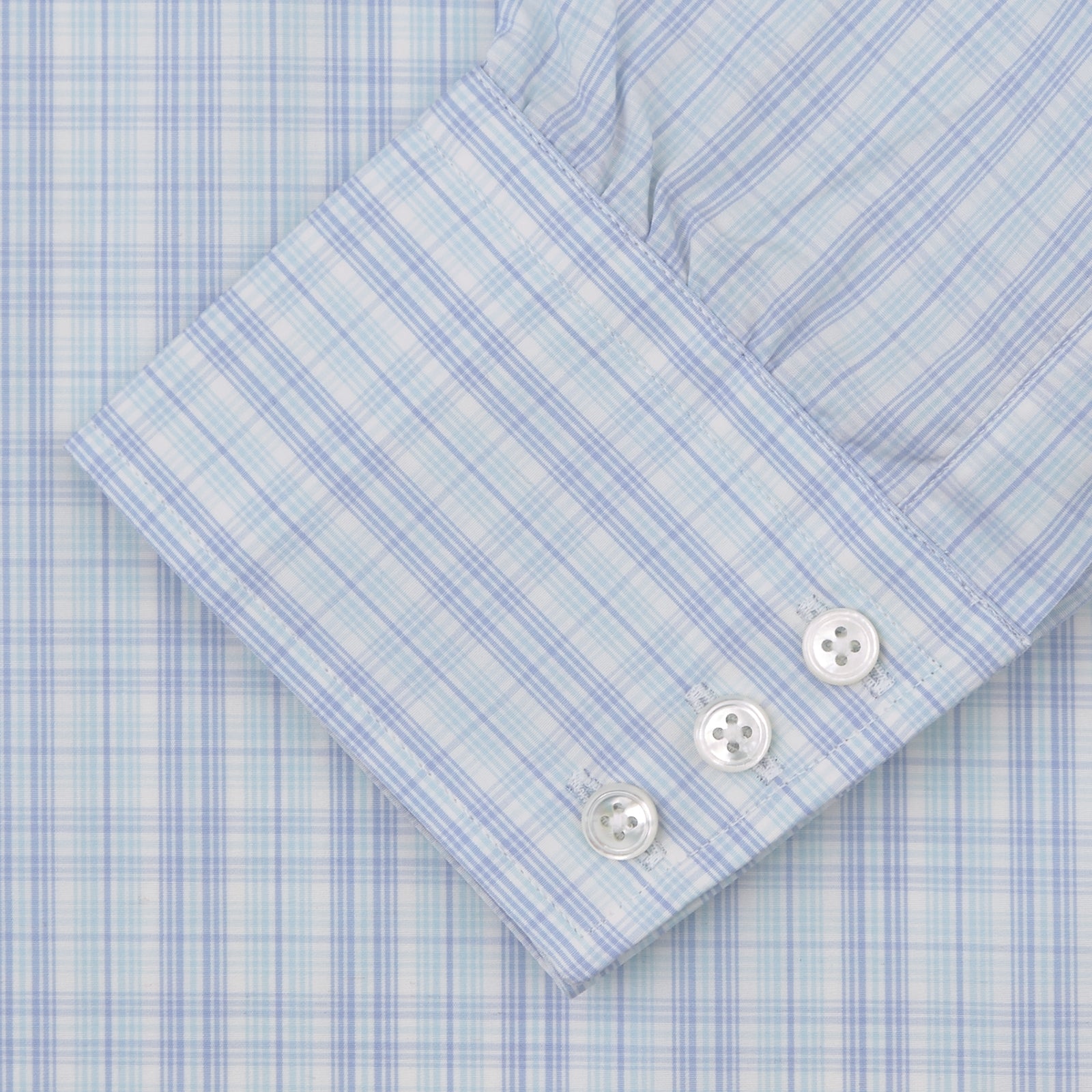 View 2 of product The Turnbull & Asser Blue and Green Business Plaid Check Shirt features a classic T&A collar and 3-button cuffs, displayed on a light grey background.