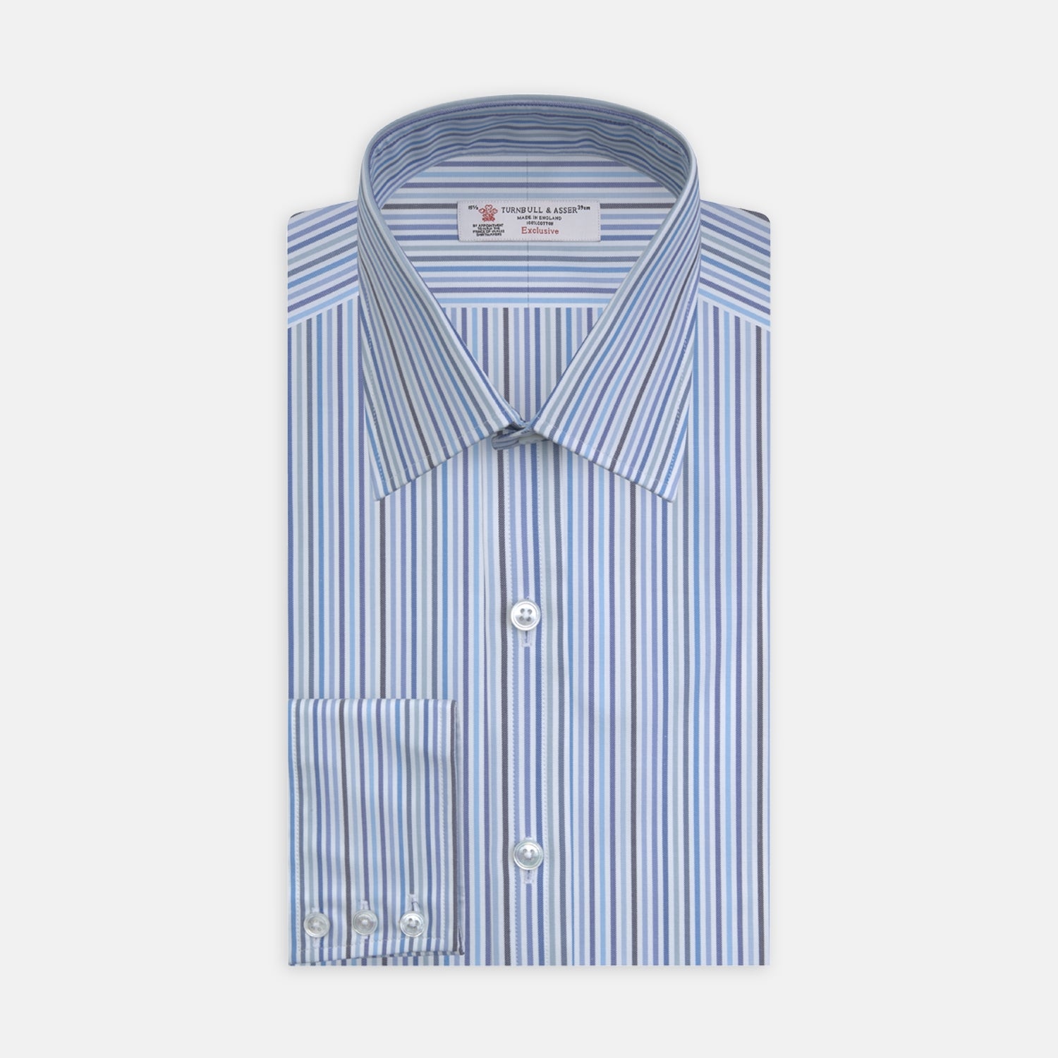View 1 of product The Turnbull & Asser Blue and White Graph Stripe Shirt features a T&A collar, 3-button cuffs, and crisp vertical stripes, exemplifying refined bespoke tailoring. Displayed neatly folded on a plain light background.