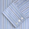 View 2 of product The Turnbull & Asser Blue and White Graph Stripe Shirt features a T&A collar, 3-button cuffs, and crisp vertical stripes, exemplifying refined bespoke tailoring. Displayed neatly folded on a plain light background.