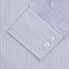 View 2 of product The Turnbull & Asser Light Blue Double Stripe Sea Island Quality Cotton Shirt features a T&A collar, 3-button cuffs, and white buttons, neatly folded and displayed against a plain light background.