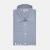 View 1 of product The Turnbull & Asser Blue Cashmere Blend Shirt features a T&A collar and 3-button cuffs, elegantly folded and showcased against a plain white background.