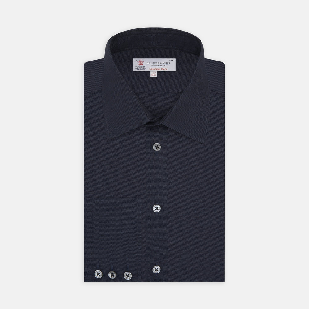 A navy cashmere blend Turnbull & Asser shirt with a T&A collar and 3-button cuffs, neatly folded and displayed against a plain white background.