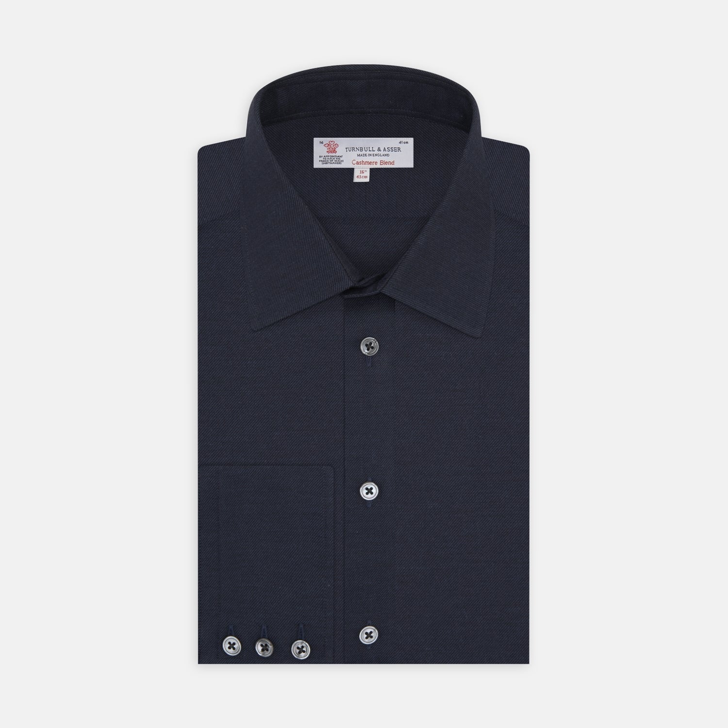 View 1 of product A navy cashmere blend Turnbull & Asser shirt with a T&A collar and 3-button cuffs, neatly folded and displayed against a plain white background.