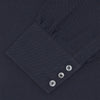 View 4 of product A navy cashmere blend Turnbull & Asser shirt with a T&A collar and 3-button cuffs, neatly folded and displayed against a plain white background.