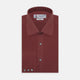 The Turnbull & Asser Burgundy Silk Shirt features a T&A collar and 3-button cuffs, offering a refined alternative to a black tie for modern style. Displayed folded on a white background.