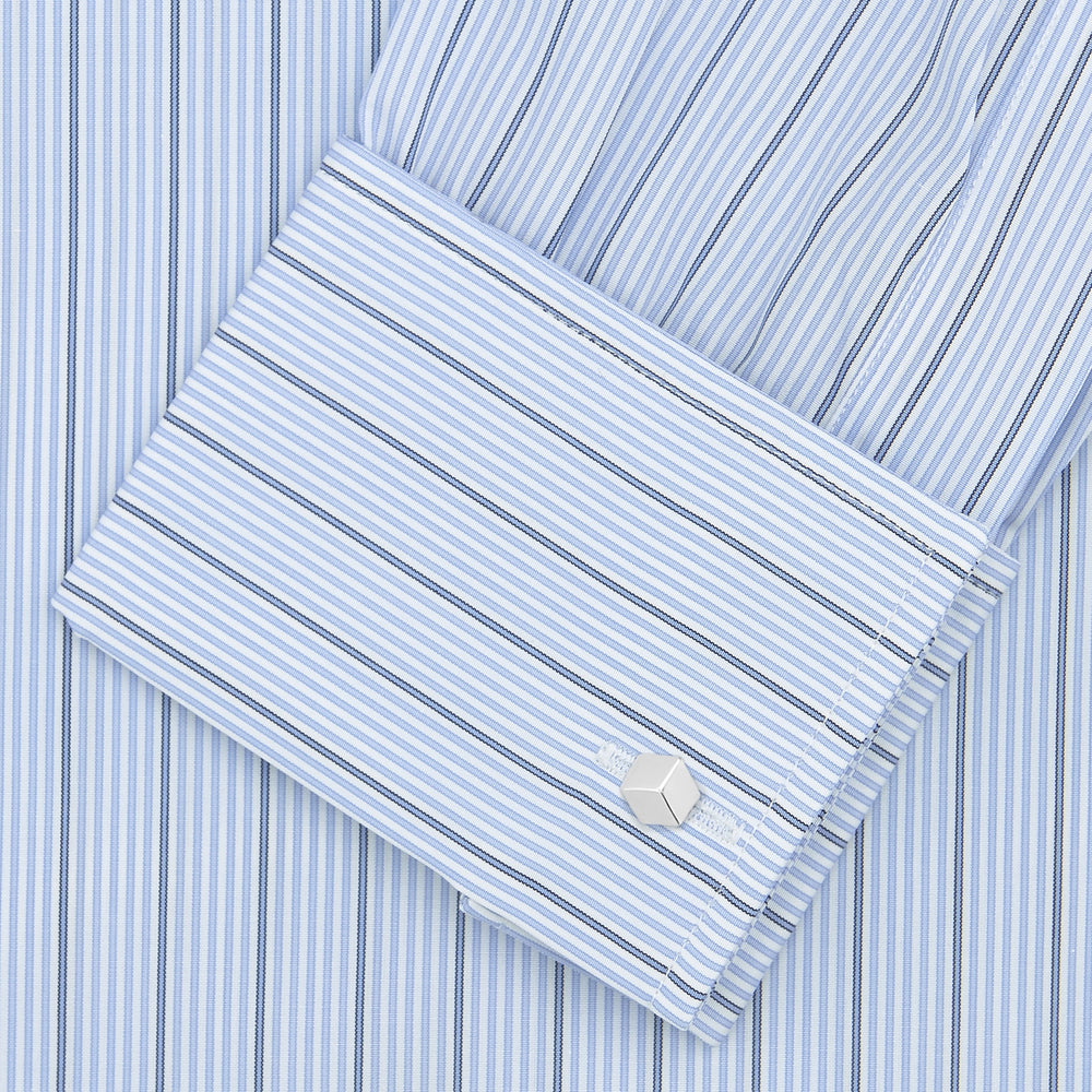 The Turnbull & Asser Sky Blue and Turquoise Pinstripe Shirt, featuring a Regent collar and double cuffs, is neatly displayed against a plain white background.