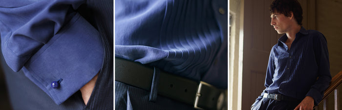 A collage of three images: a close-up of a blue shirt cuff with a button, a close-up of a tucked blue shirt and black belt, and a man wearing the shirt, leaning on a wooden railing, looking to the side.