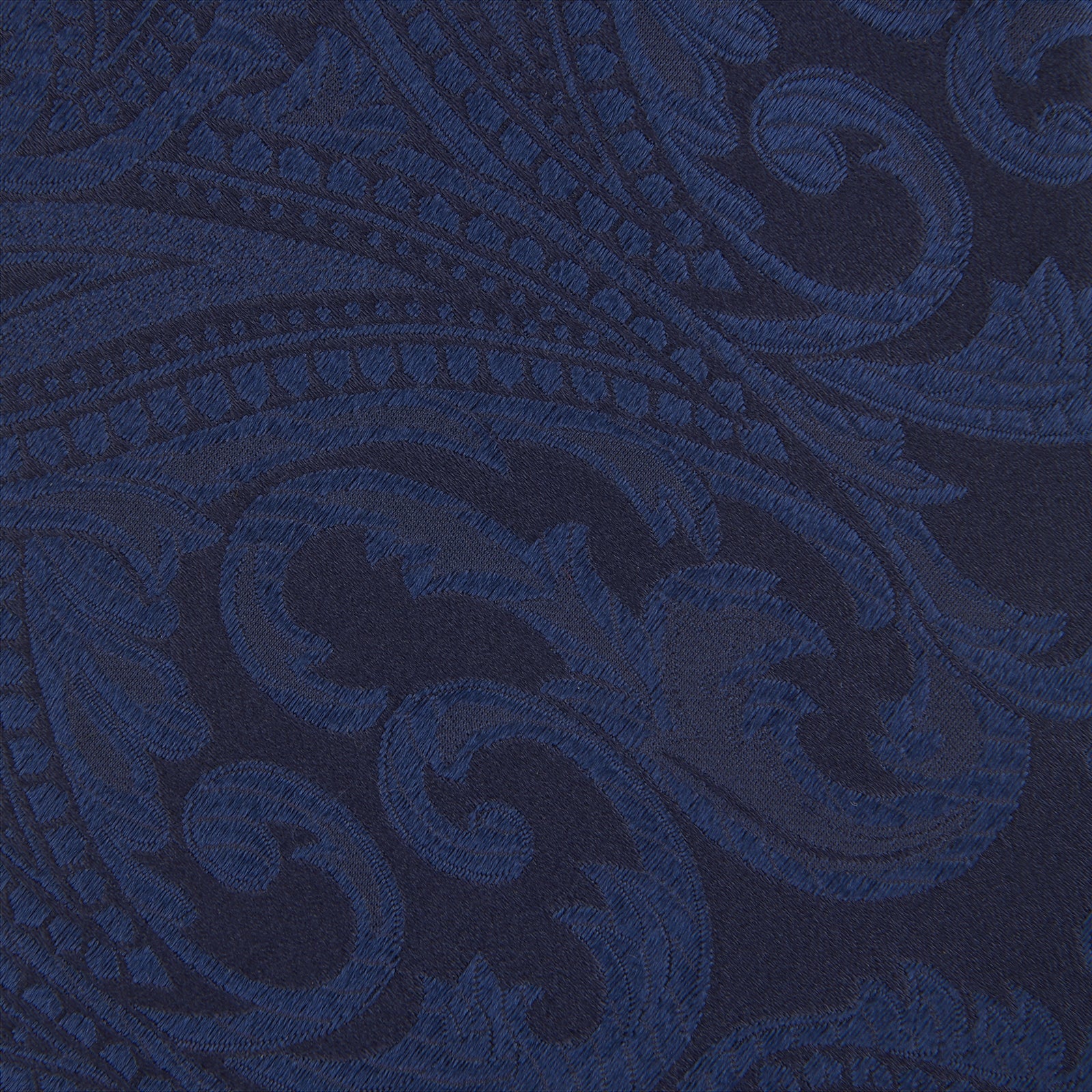 View 3 of product The Navy Paisley Silk Tie by Turnbull & Asser is a classic men's accessory in blue and black, adding sophistication to any look.