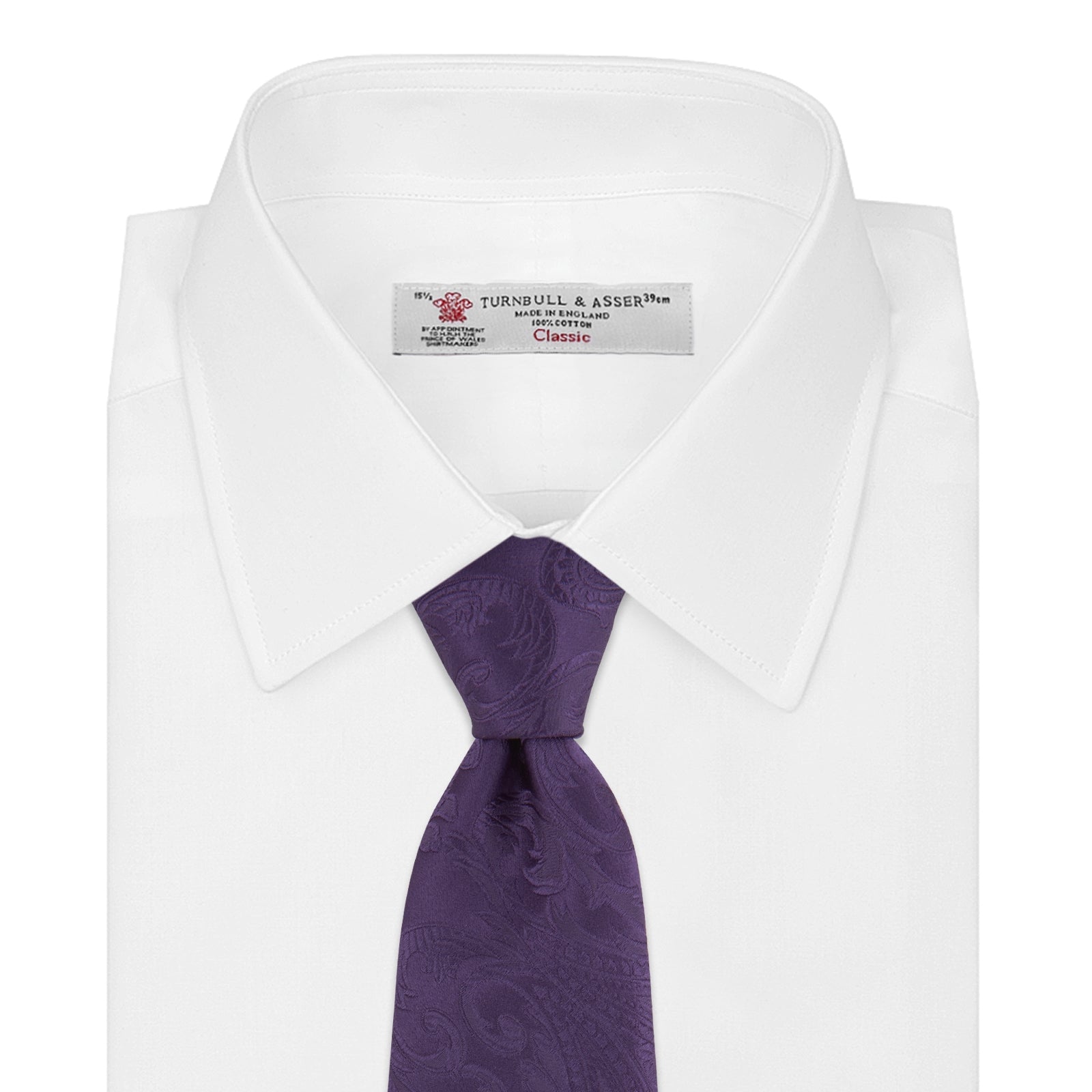 View 2 of product The Turnbull & Asser Purple Paisley Silk Tie, shown rolled on a white background, features an elegant paisley design—a stylish statement piece for any occasion.