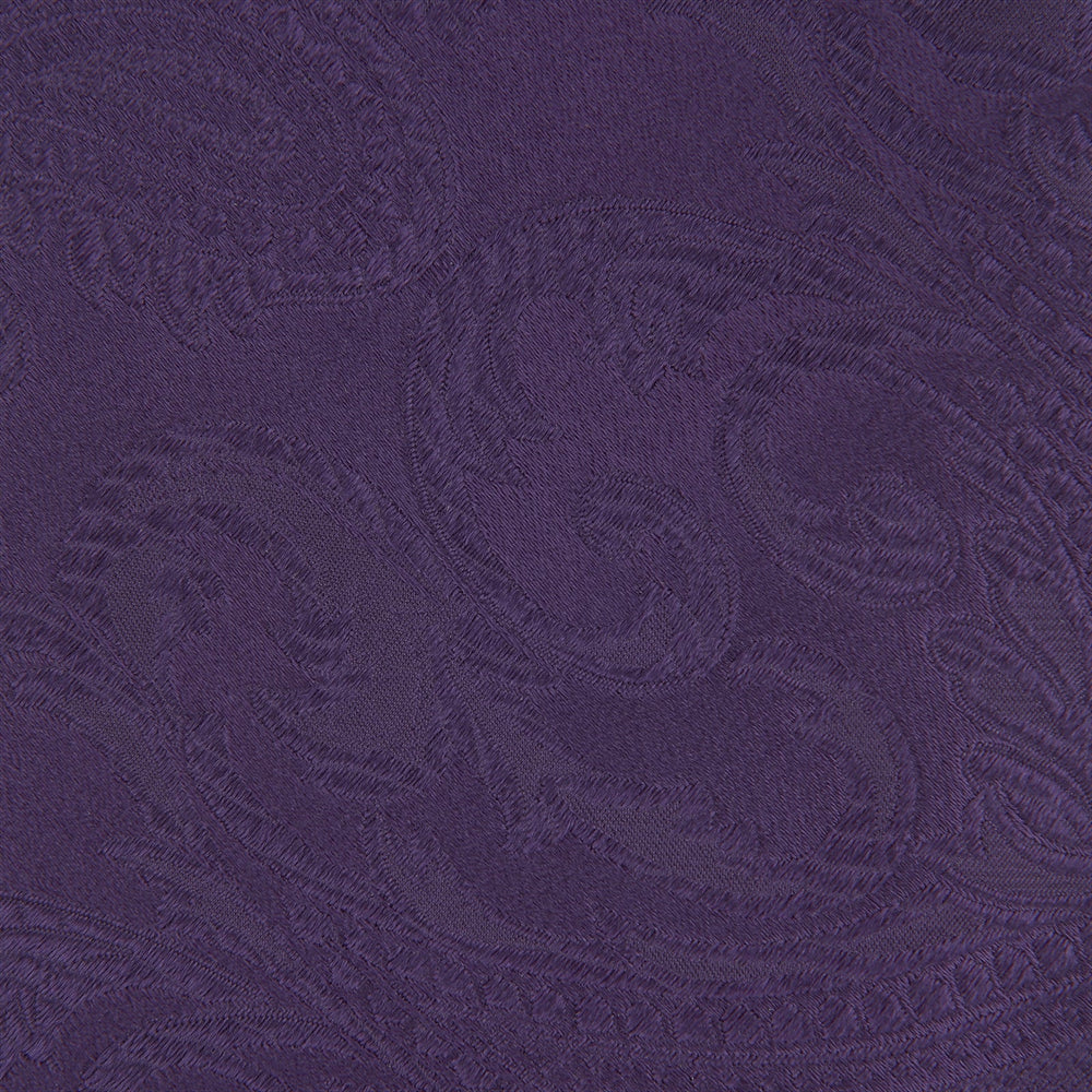 The Turnbull & Asser Purple Paisley Silk Tie, shown rolled on a white background, features an elegant paisley design—a stylish statement piece for any occasion.