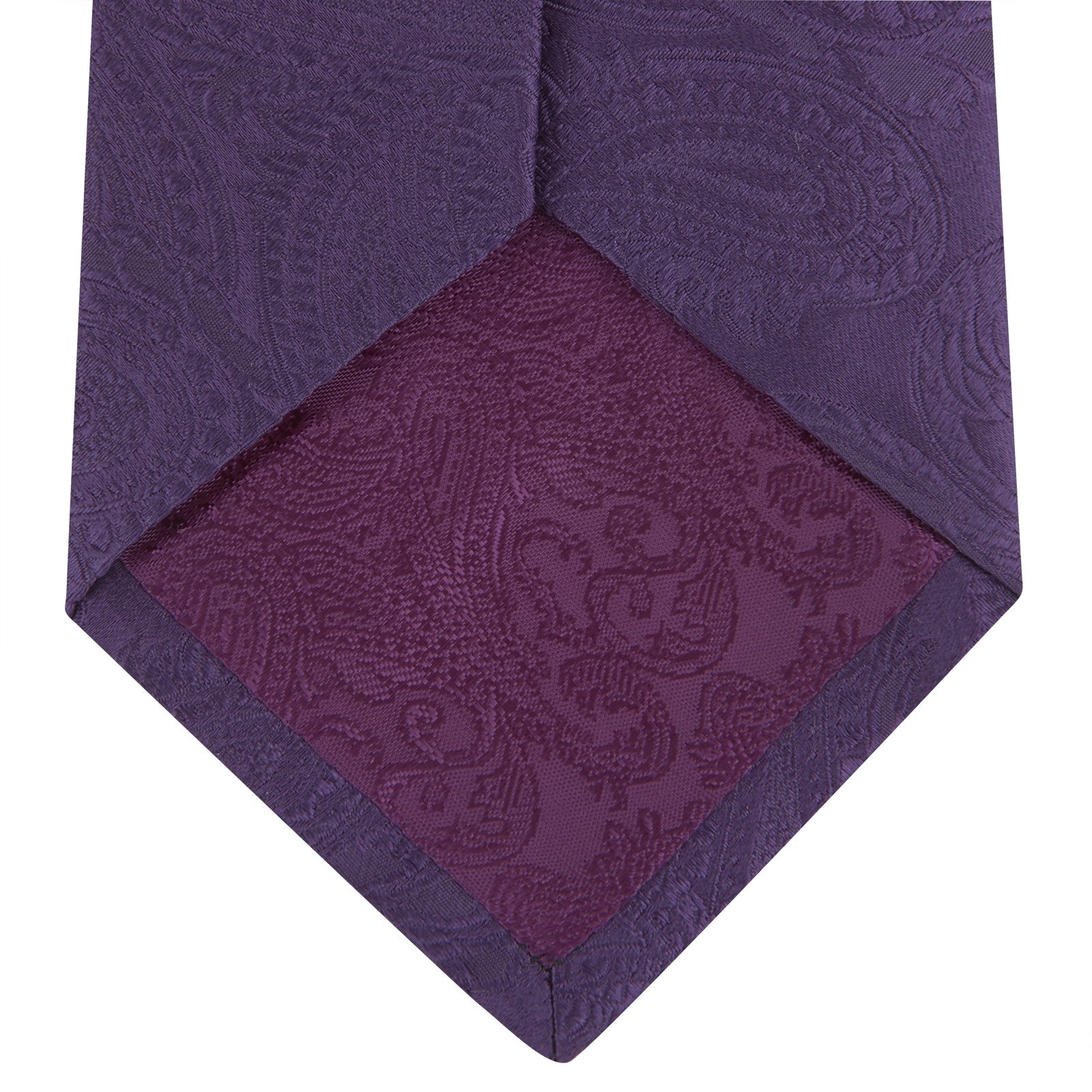 View 4 of product The Turnbull & Asser Purple Paisley Silk Tie, shown rolled on a white background, features an elegant paisley design—a stylish statement piece for any occasion.