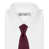 View 2 of product The Turnbull & Asser Burgundy Paisley Silk Tie, showcased rolled on a white background, is an elegant statement piece featuring a refined paisley design for any wardrobe.