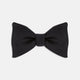 The Turnbull & Asser Black Satin Bow Tie features a classic, neatly tied shape, displayed on a white background—a sophisticated accessory for formal attire.