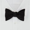 View 2 of product The Turnbull & Asser Black Satin Bow Tie features a classic, neatly tied shape, displayed on a white background—a sophisticated accessory for formal attire.