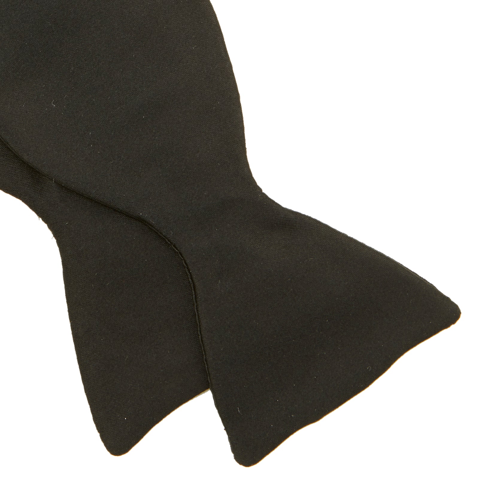 View 4 of product The Turnbull & Asser Black Satin Bow Tie features a classic, neatly tied shape, displayed on a white background—a sophisticated accessory for formal attire.