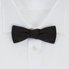View 2 of product The Black Narrow Silk Bow Tie by Turnbull & Asser features a classic slim design with a matte finish, neatly tied and centered on a plain white background—perfect for formal occasions.