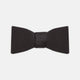 The Turnbull & Asser Black Silk Bow Tie features a matte finish and classic design, ideal for formal occasions. Shown pre-tied against a plain white background.