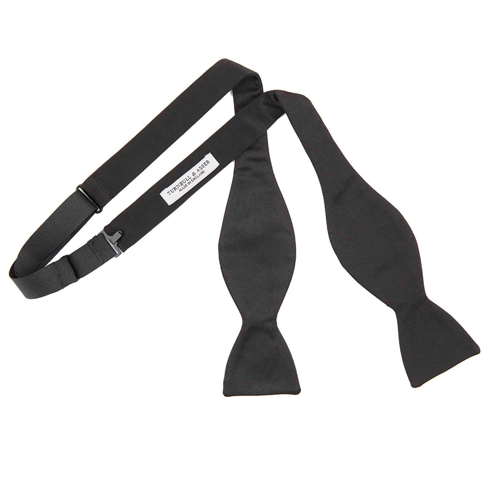 View 4 of product The Turnbull & Asser Black Silk Bow Tie features a matte finish and classic design, ideal for formal occasions. Shown pre-tied against a plain white background.